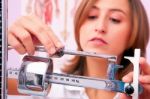 Female Doctor Weighing Stock Photo