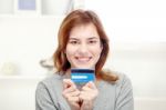 Happy Girl Holding Credit Card Stock Photo