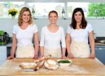 Young Chefs In Kitchen Room Stock Photo