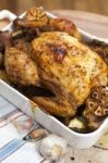 Roasted Chicken With Garlic And Potatoes Stock Photo