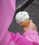 Kid Eating Delicious Ice Cream Stock Photo