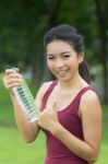 Young Woman Drinking Water Stock Photo