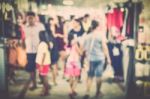 Blurred Crowd Of People In The Market Stock Photo