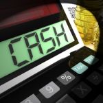 Cash Calculated Shows Money Earning And Spending Stock Photo