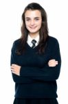 Schoolgirl With Crossed Arms Stock Photo