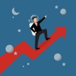 Businessman Astronaut Standing On A Growing Graph Stock Photo