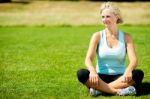 Woman Relaxing Outdoors, Peaceful Morning Stock Photo