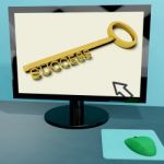 Success Key On Computer Shows Business Achievement Online Stock Photo