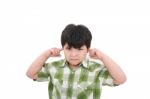 Boy Closed His Ears Stock Photo