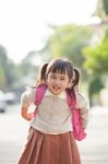 Asian Student Backpacking School Bag With Smiling Face Happiness Emotion Stock Photo