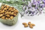 Almond Grains On White Clean Table Stock Photo