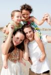 Family In The Beach Stock Photo