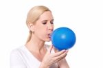 It's Hard Blowing A Balloon Stock Photo