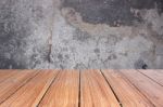 Top Of Wood Table On Old Concrete Wall Background Stock Photo