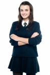 Schoolgirl With Crossed Arms Stock Photo