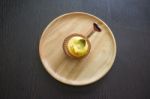 Portuguese Egg Tart On A Wood Dish With White Greeting  Blank Paper Stock Photo