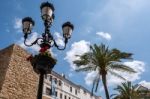 Ornate Street Lamp In The Old Quarter Of Marbella Stock Photo