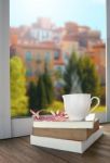 Relaxing With Cup Of Hot Drink Tea Or Coffee And Book Lying Besi Stock Photo