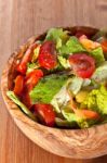 Wooden Bowl With Salad Stock Photo