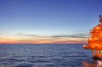 Sun Set At The Sea From Offshore Platform With Warm Light And Li Stock Photo