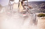 People Riding Four Wheeler Stock Photo