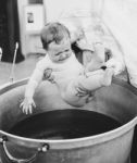 Little Baby Baptism In Church Stock Photo