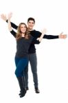 Playful Young Couple, Full Length Portrait Stock Photo