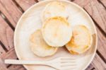 Mini Pies On Wooden Plate Stock Photo