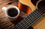 Coffee And Guitar Stock Photo