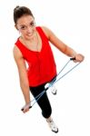 Girl Exercising With Elastic Fitness Band Stock Photo