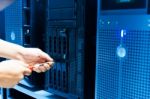 Man Fix Server Network In Data Center Room Stock Photo