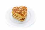 Pile Of Heart Shaped Pancakes On White Plate Stock Photo