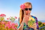 Caucasian Woman Drinking Pine Apple Juice Stock Photo