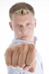 White Male Giving Punch Stock Photo