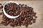 Coffee Bean On The Wooden Floor Stock Photo