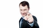 Handsome Businessman Pointing At You Stock Photo