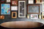 Selected Focus Empty Brown Wooden Table And Coffee Shop Or Resta Stock Photo