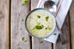 Bowl Of Broccoli And Cheddar Cheese Soup Stock Photo