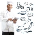 Chef Using Digital Tablet Stock Photo