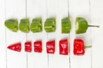 Fresh Cayenne Sweet Peppers Sliced In Pieces Stock Photo