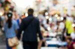 Blurred People Walking On The Street Stock Photo