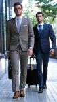 Two Young Executives Arriving At The Hotel Stock Photo