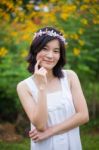 Young Woman With A Crown Of Flowers Stock Photo