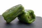 Two Green Bell Peppers Stock Photo