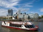 Tourist Boat Cruising Along The River Thames Stock Photo