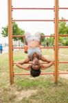 Young African Woman Doing Sit-ups Stock Photo