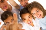 Smiling Teenagers Looking Up Stock Photo