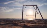 Swing On The Beach Stock Photo