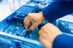 Man Fix Server Network In Data Center Room Stock Photo