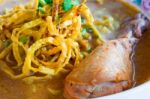 Egg Noodle And Yellow Curry With Chicken Stock Photo